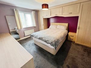 Bedroom One- click for photo gallery